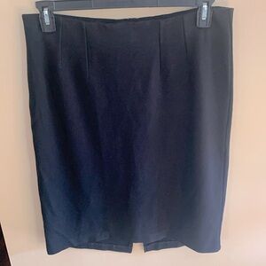 Black pencil skirt with back split. Pull on style very forgiving fit.
